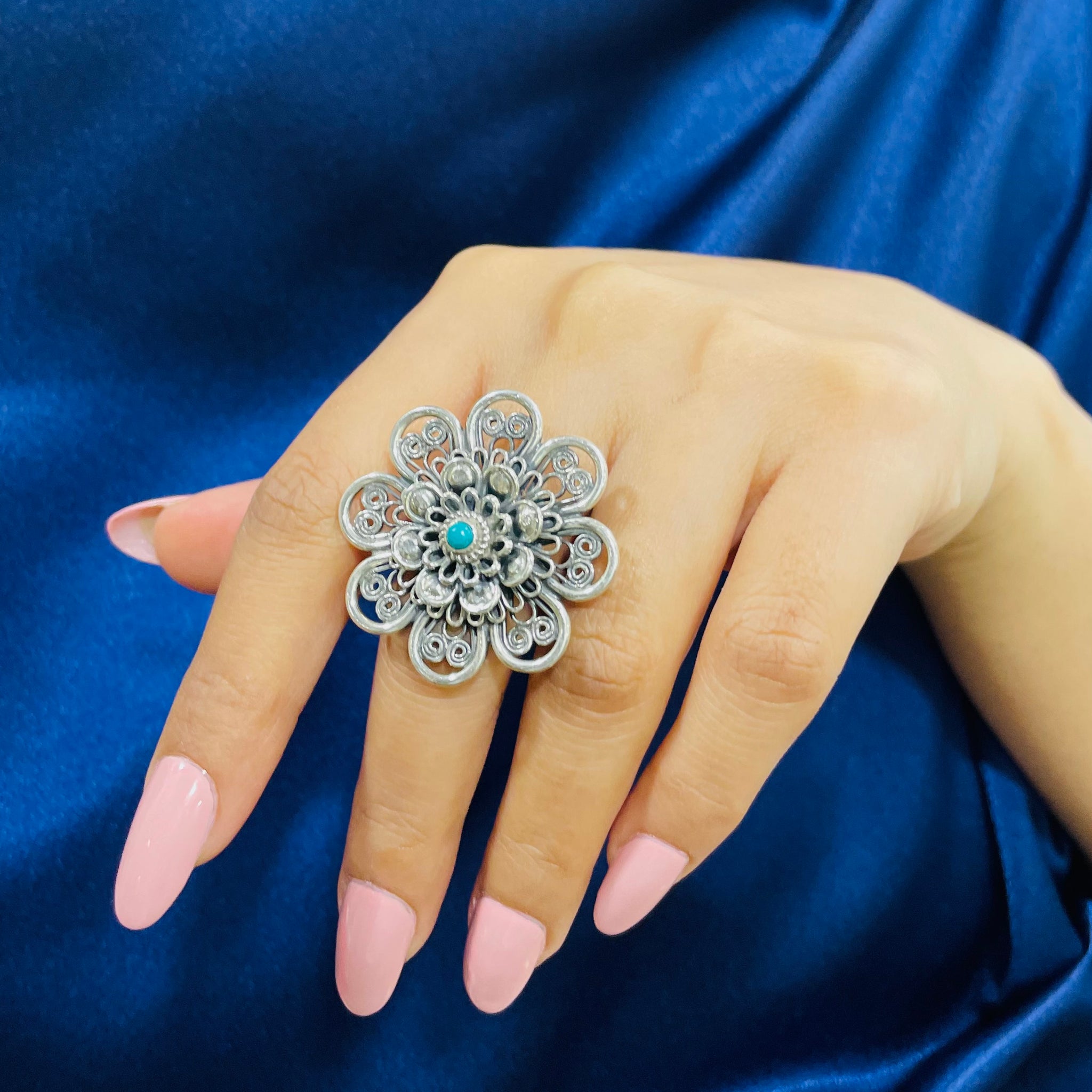 92.5 Silver Turquoise Intricately Carved Pushpa ring